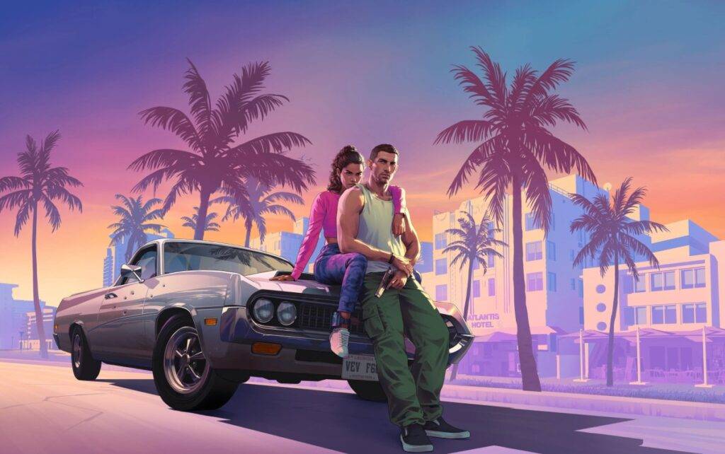 Two people from Grand Theft Auto 6 sit on the hood of a classic car parked on a palm-lined street at sunset, with pastel-colored buildings in the background.