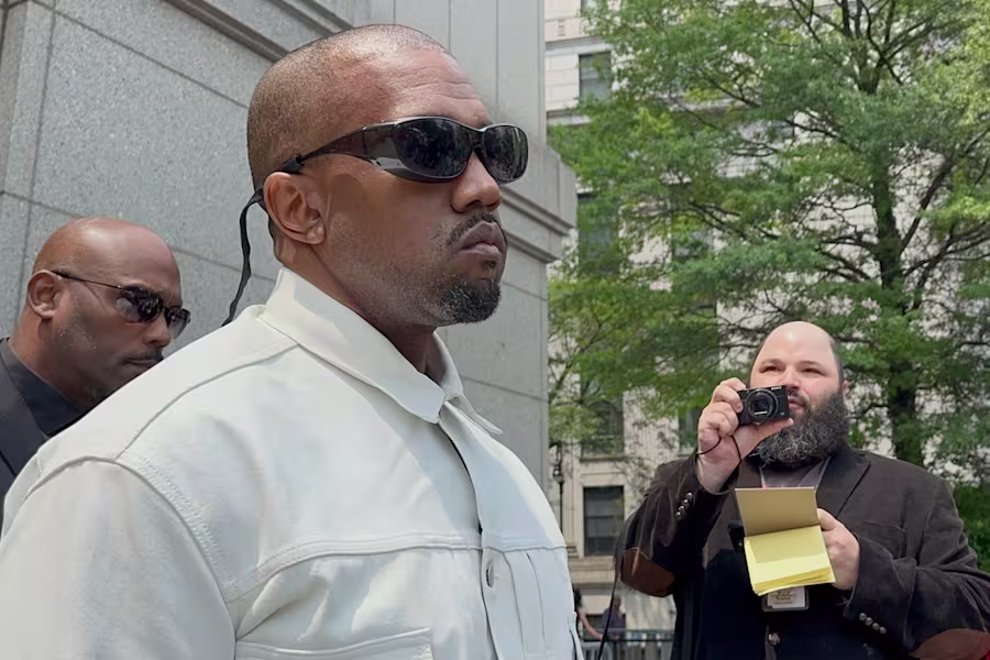Ye, the rapper formerly known as Kanye West, leaves federal court during the trial of Sean "Diddy" Combs in New York, Friday, June 13, 2025. (AP Photo/Larry Neumeister)